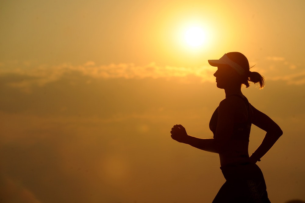 Woman jogging to build self-esteem