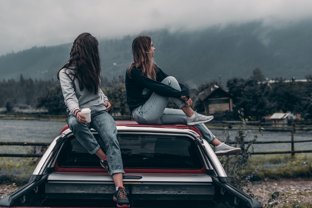 Women On Top Of A Truck