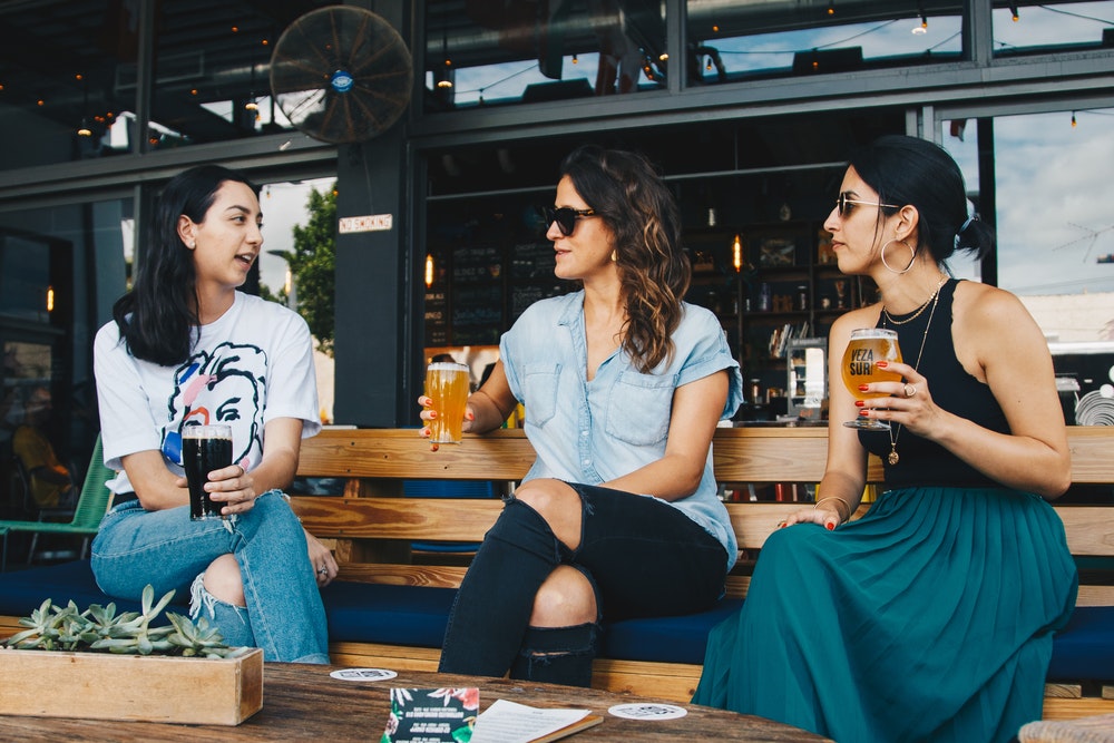 Women Talking At A Pub