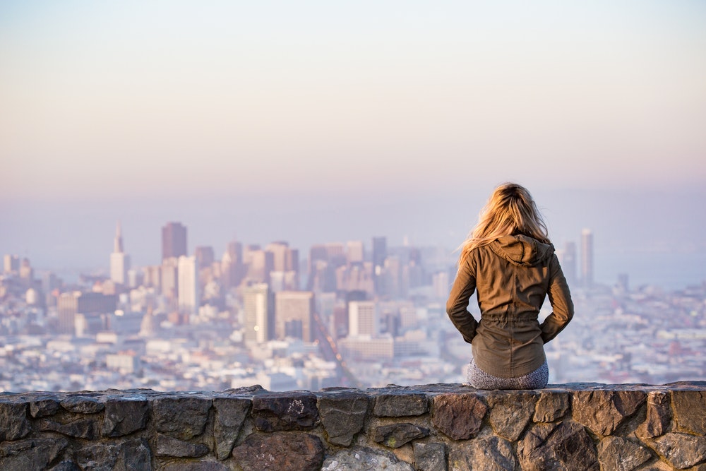 Woman Overlooking The City