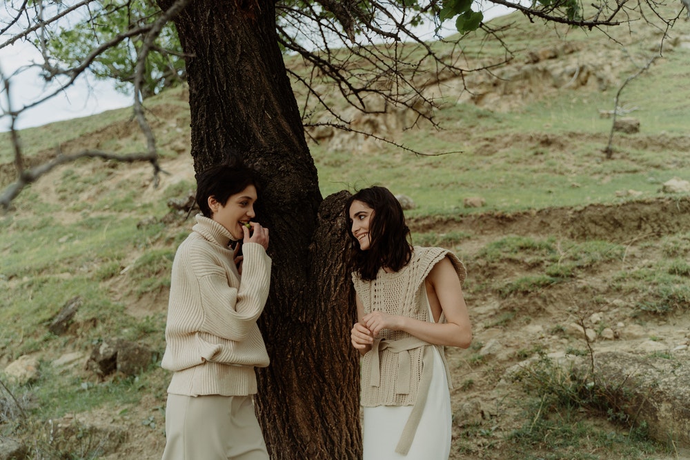 Women Beside A Tree
