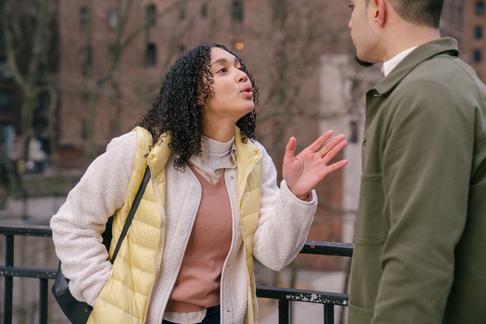 Woman Speaking To A Man
