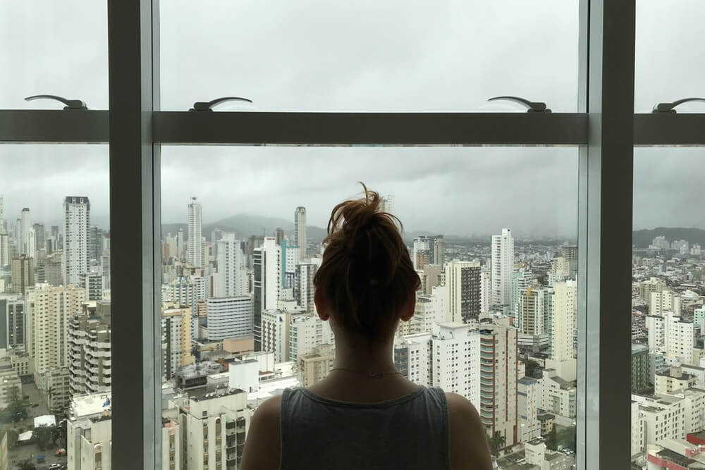 Woman In Front Of A Window