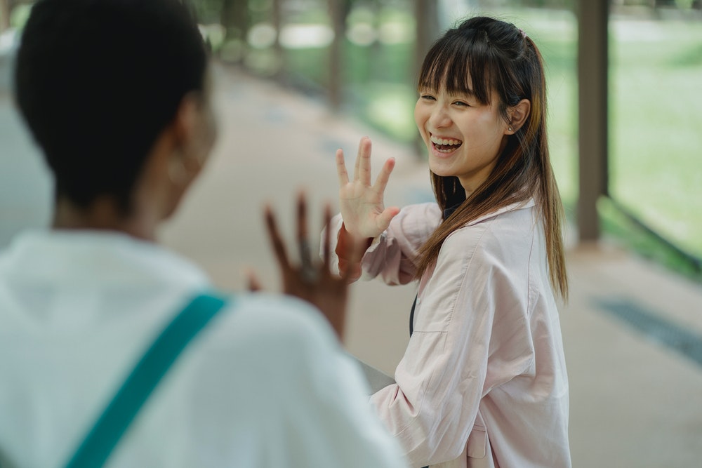 Woman Waving Goodbye