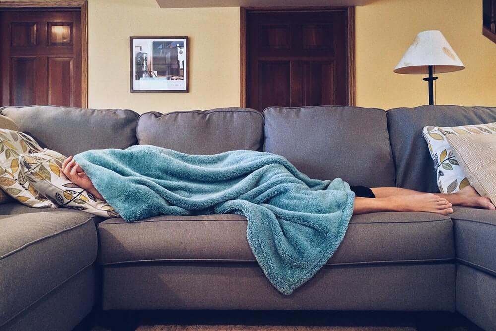Person Sleeping On A Couch